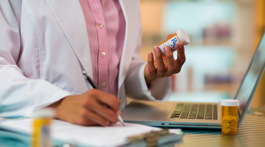 pharmacist-reviewing-prescription