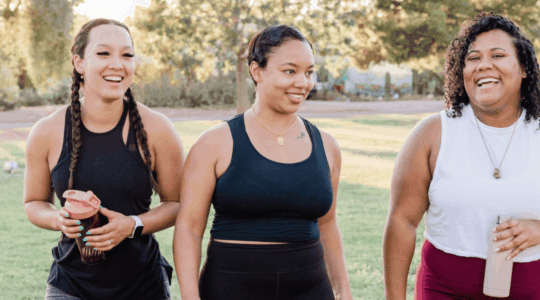three-women-exercising-outside