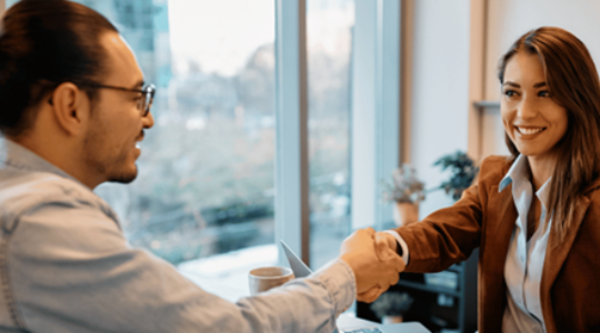 man-woman-shaking-hands